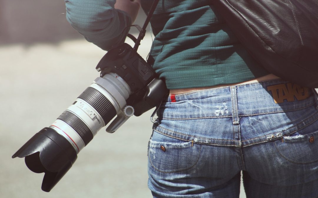 woman with a video camera