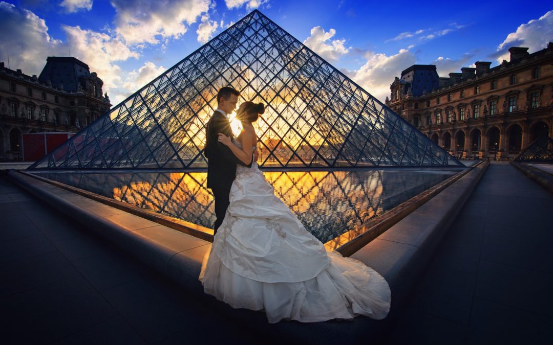 bride and groom in front of museum