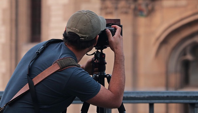 photographer with a black camera