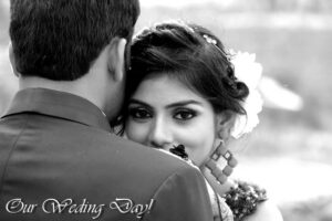 Indian bride looking at the camera over the grooms shoulder