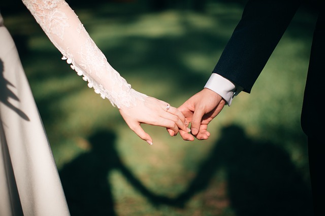 hands of bride and groom 