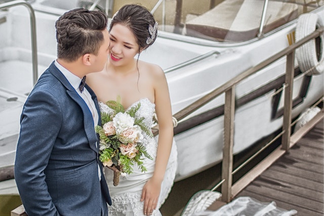 bride and groom on a boat