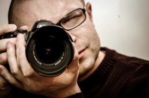 man with a canon camera