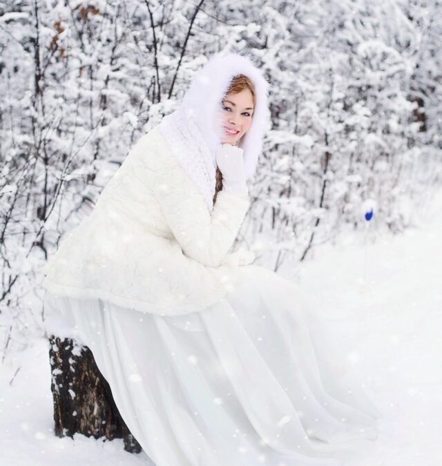 bride sitting on the snow