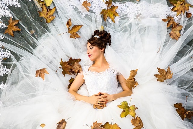 bride lading on hay