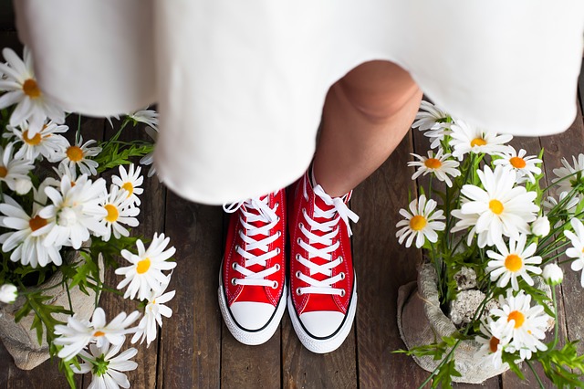 bride wearing red converse shoes