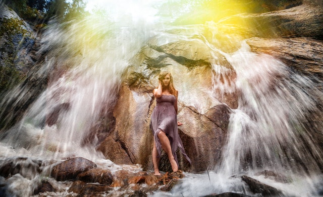 waterfall over woman
