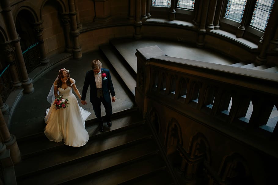 bride and groom on stairs