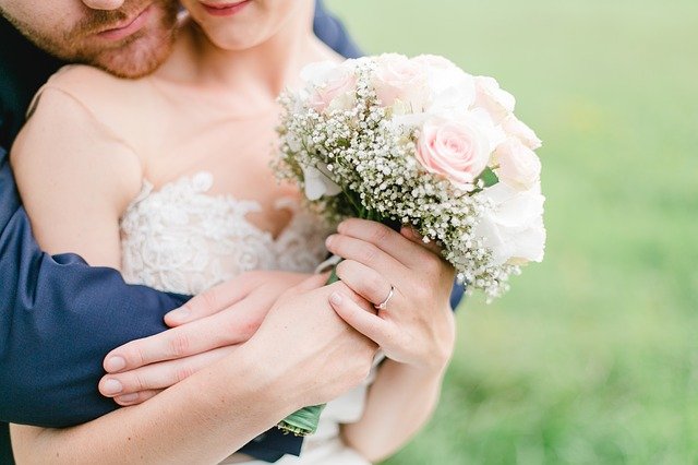 bride and groom with bouquet