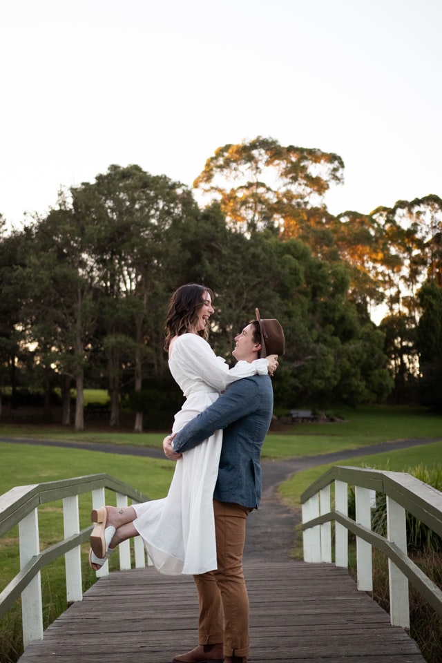 groom lifting up bride