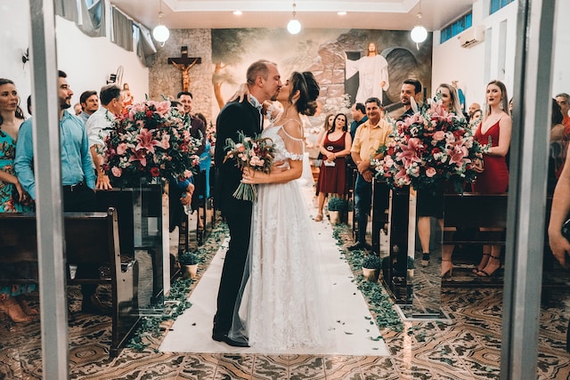 bride and groom kiss