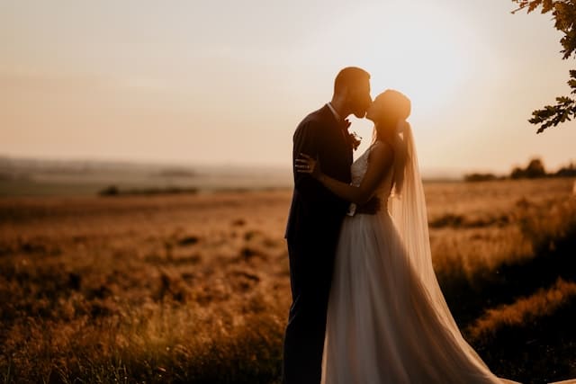 Bride and groom at sunset