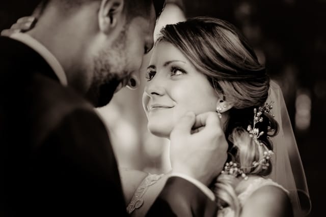 Bride and groom kissing